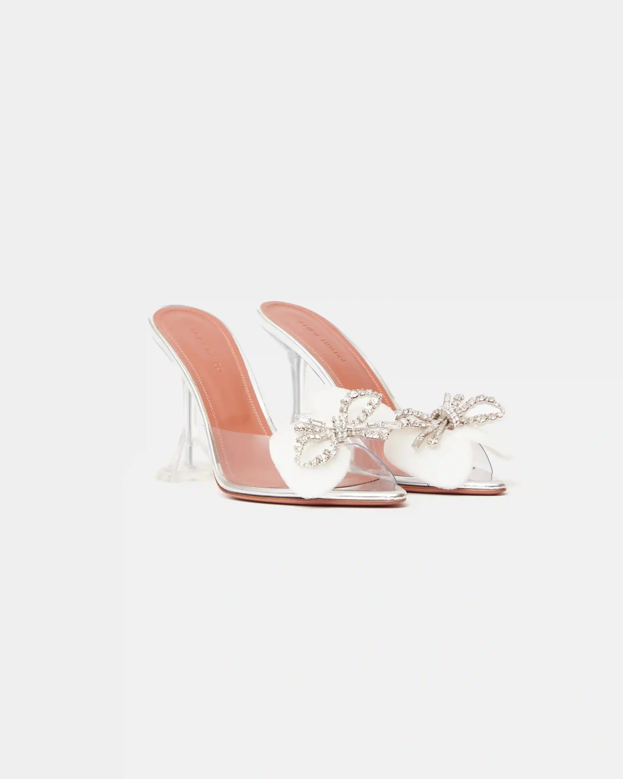 Amina Muaddi Rosie Glass PVC transparent heeled slippers with rhinestone bow detail