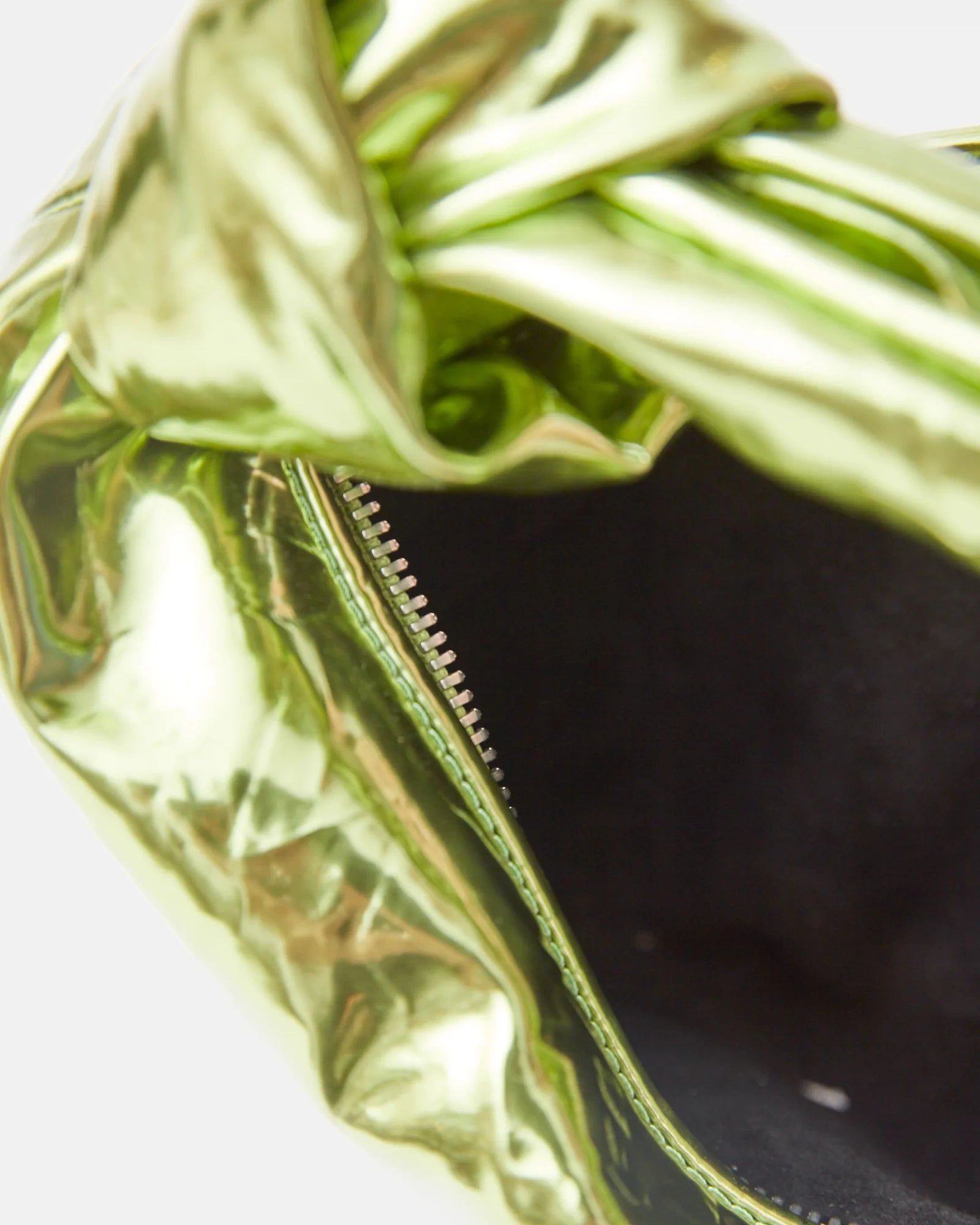 Bottega Veneta Jodie Mini Clutch bag in Chlorophyll color and Mettalic Leather
