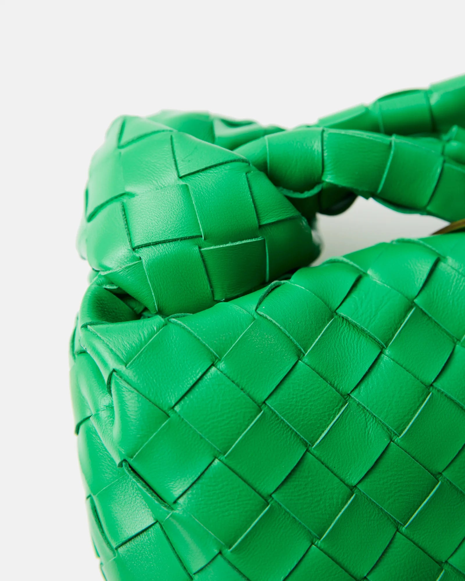 Bottega Veneta Jodie Mini Clutch bag in green Intrecciato woven leather with a knotted handle