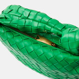 Bottega Veneta Jodie Mini Clutch bag in green Intrecciato woven leather with a knotted handle