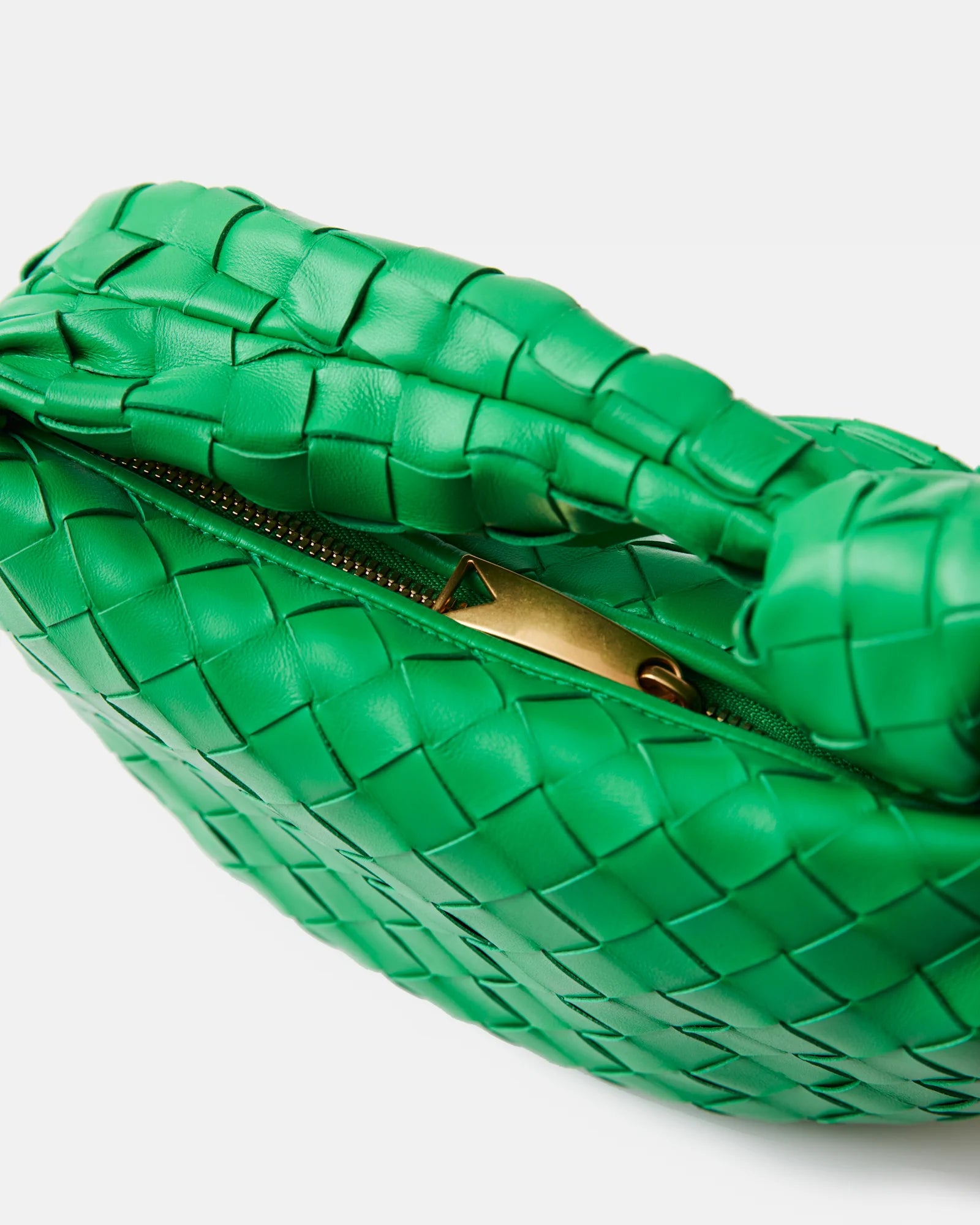 Bottega Veneta Jodie Mini Clutch bag in green Intrecciato woven leather with a knotted handle