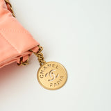 Chanel 22 Handbag in light orange color and Shiny Calfskin leather in GHW 