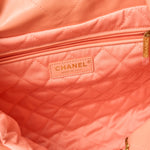 Chanel 22 Handbag in light orange color and Shiny Calfskin leather in GHW 