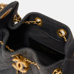 Chanel 25 shoulder bag in black color and washed denim material in GHW 