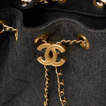 Chanel 25 shoulder bag in black color and washed denim material in GHW 