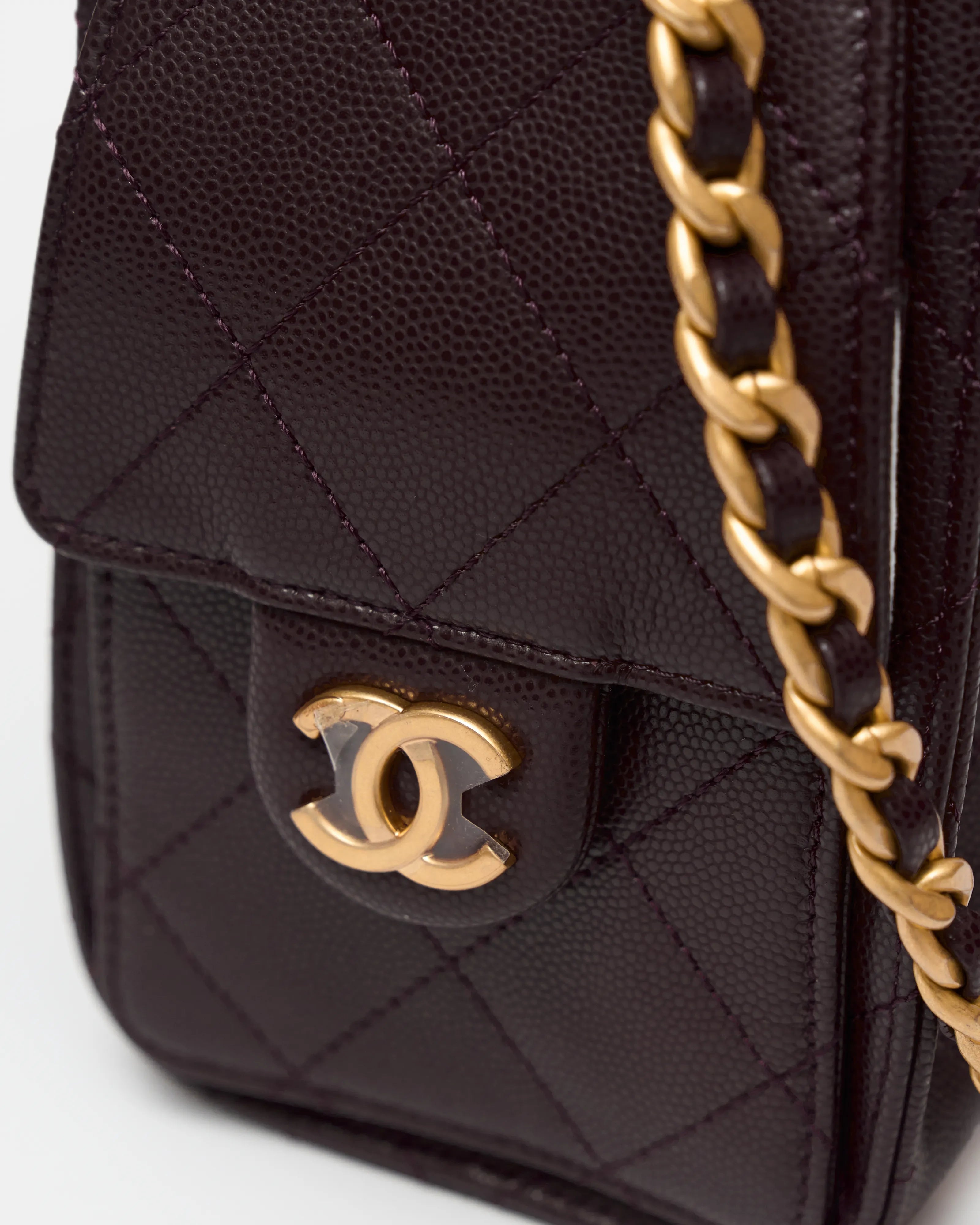 Chanel 25 shoulder bag in brown color and grained calfskin material in GHW 
