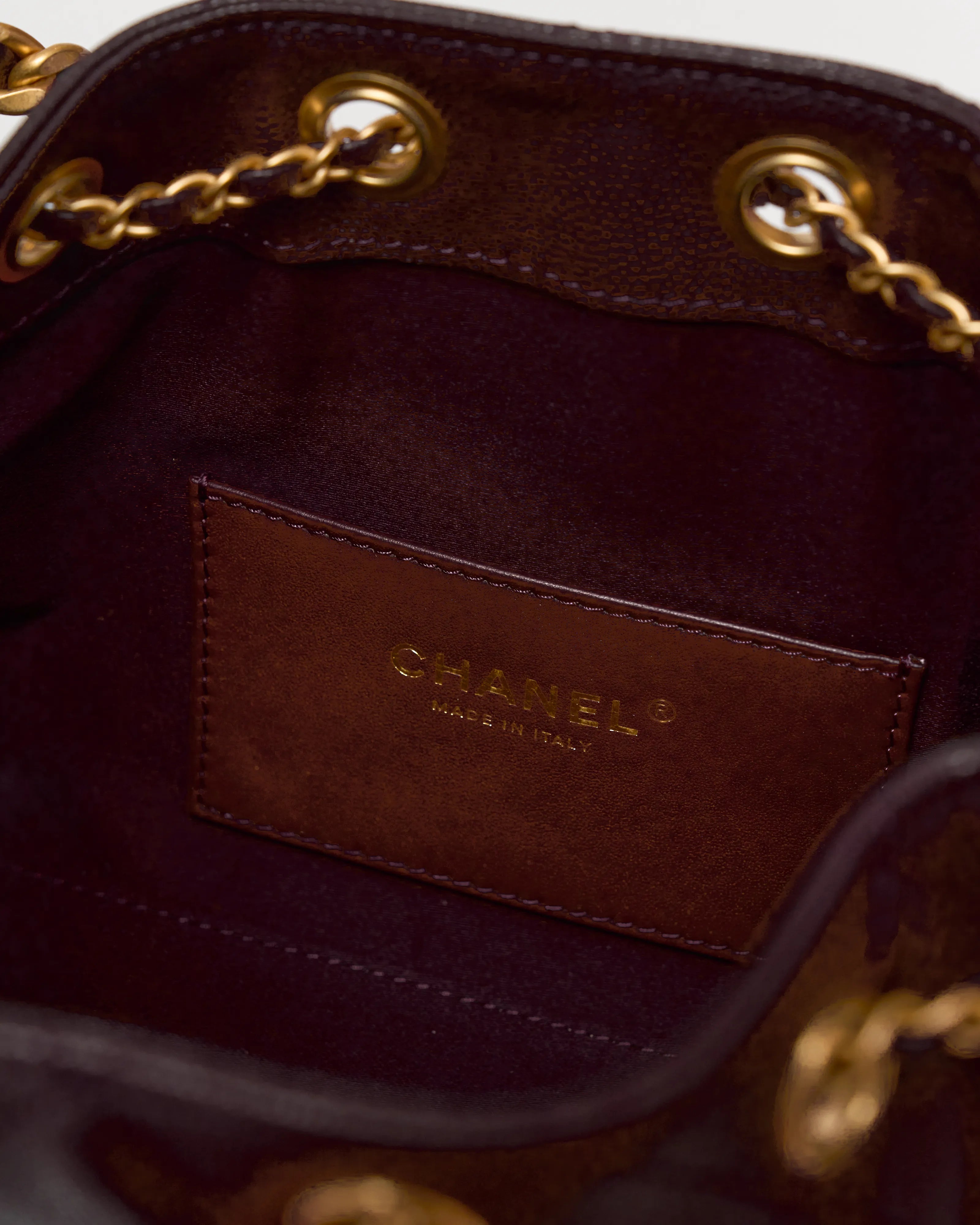 Chanel 25 shoulder bag in brown color and grained calfskin material in GHW 
