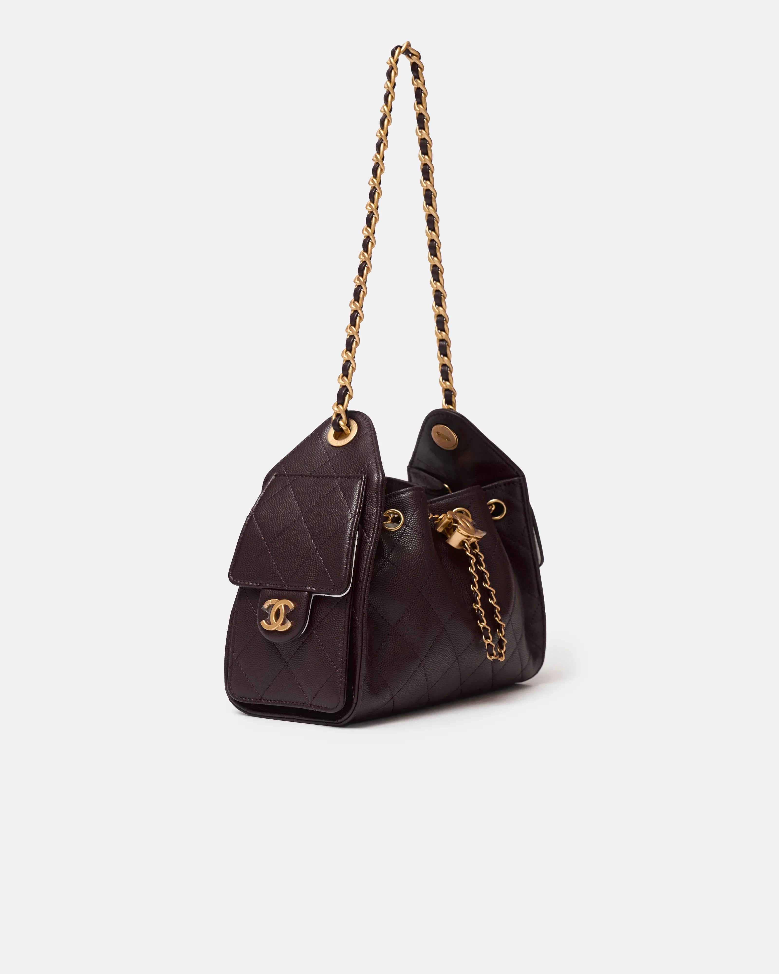 Chanel 25 shoulder bag in brown color and grained calfskin material in GHW 