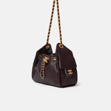 Chanel 25 shoulder bag in brown color and grained calfskin material in GHW 