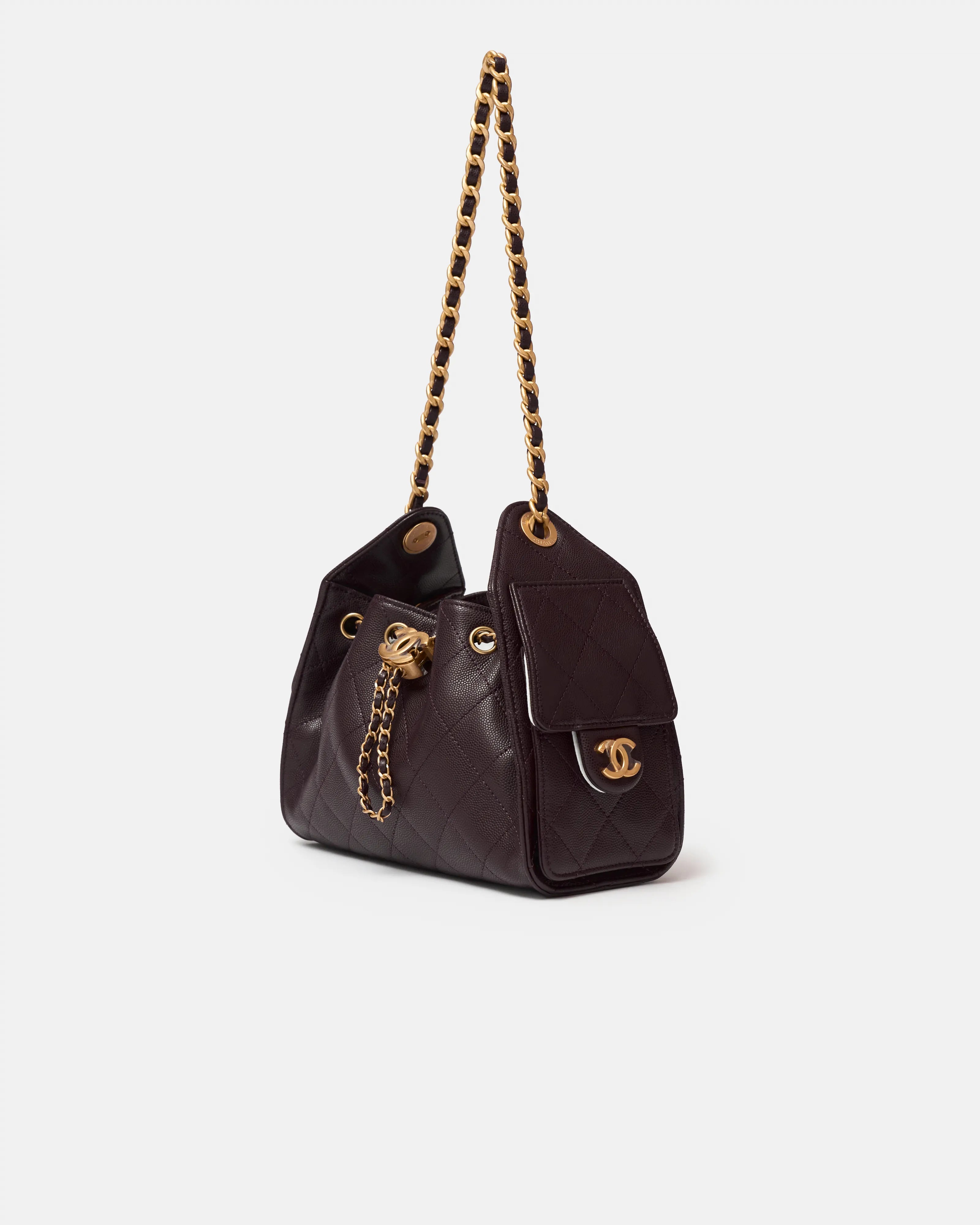 Chanel 25 shoulder bag in brown color and grained calfskin material in GHW 
