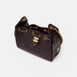 Chanel 25 shoulder bag in brown color and grained calfskin material in GHW 