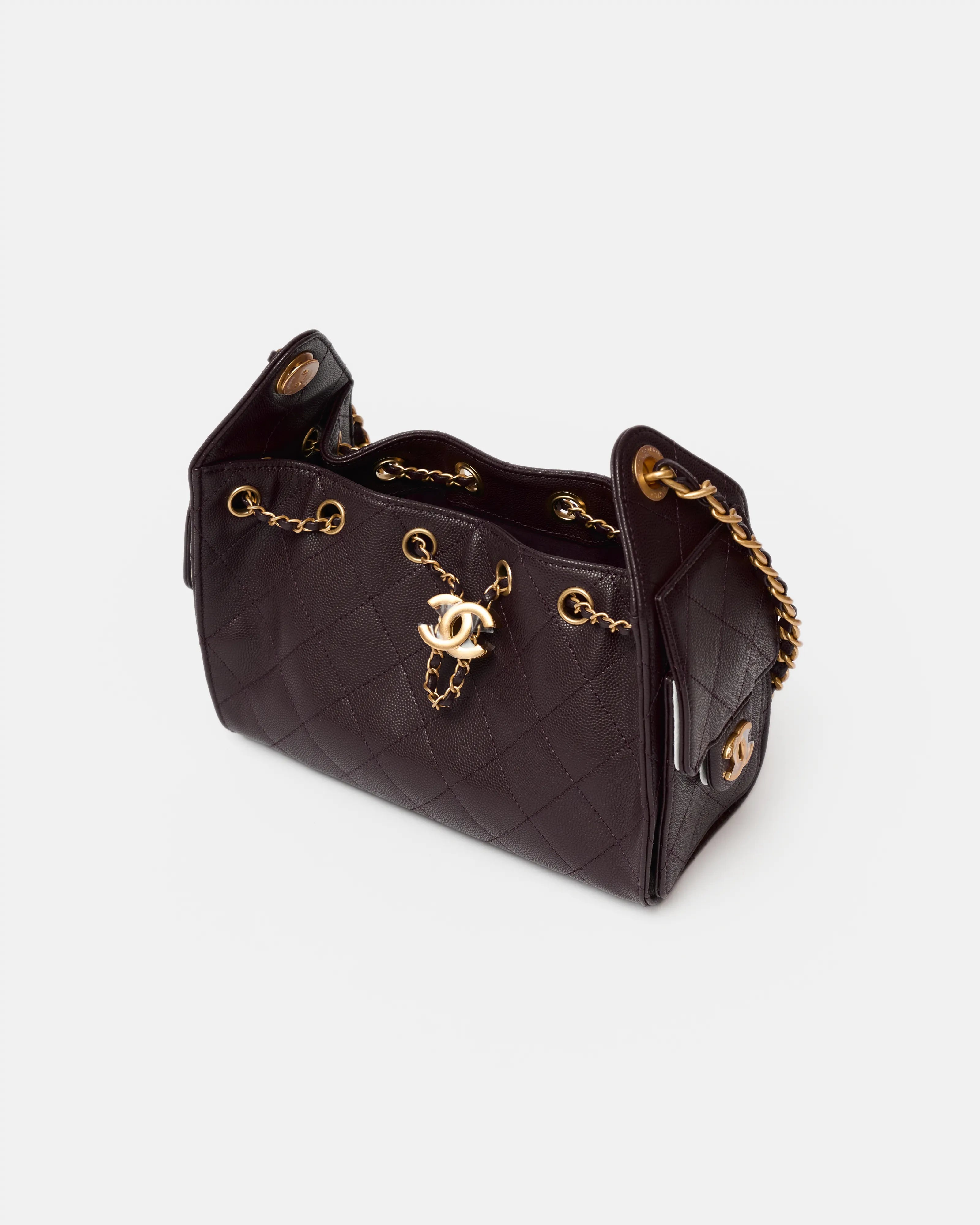 Chanel 25 shoulder bag in brown color and grained calfskin material in GHW 