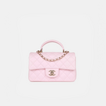Chanel Classic Mini Flap Top Handle crossbody bag in Light Pink color and Lambskin quilted leather in GHW