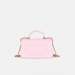 Chanel Classic Mini Flap Top Handle crossbody bag in Light Pink color and Lambskin quilted leather in GHW