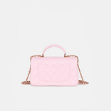 Chanel Classic Mini Flap Top Handle crossbody bag in Light Pink color and Lambskin quilted leather in GHW