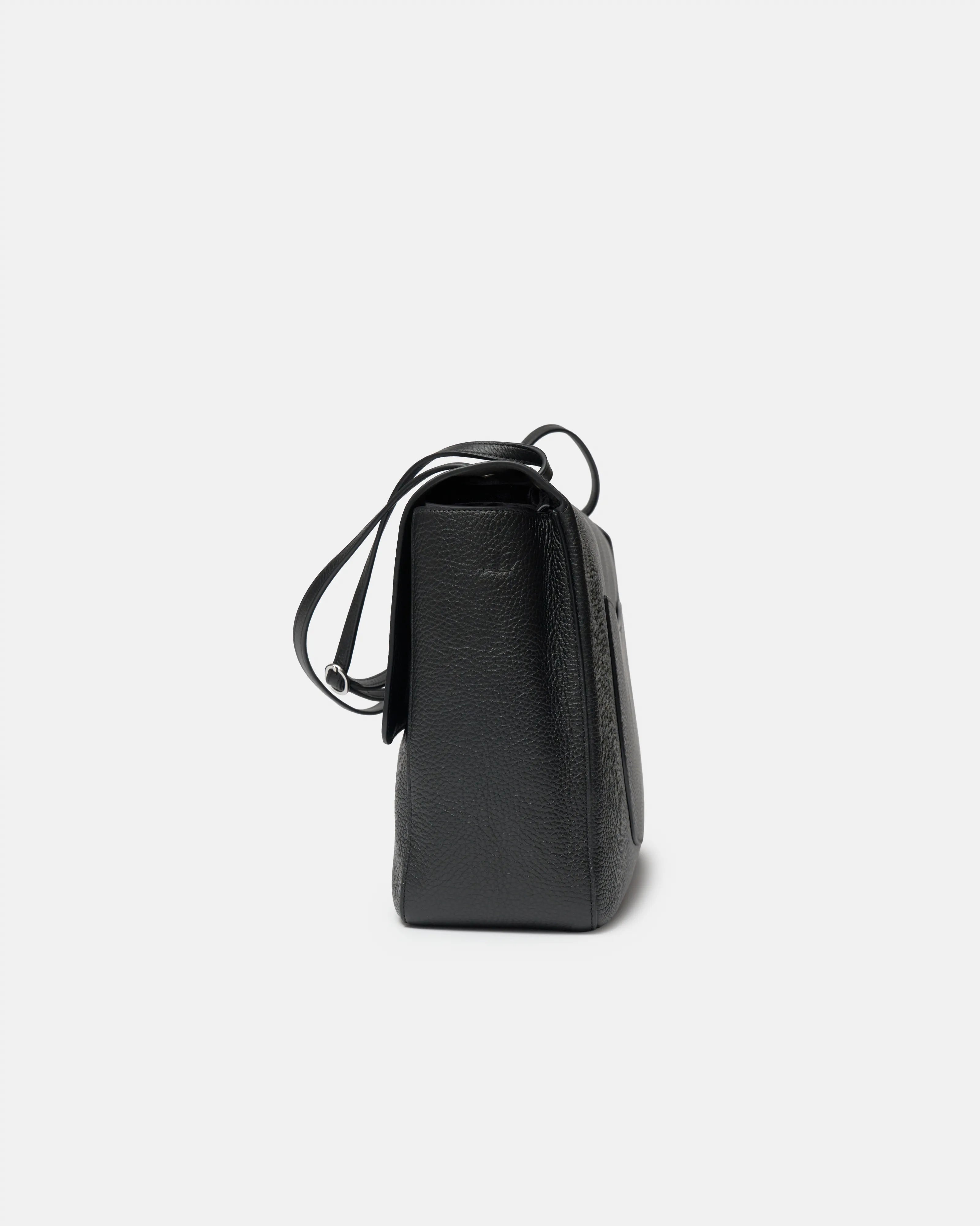 Chanel maxi flap shoulder bag in black color and grained calfskin material in PHW 