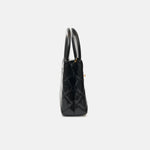 Chanel Mini Kelly crossbody bag in black color and Calfskin leather in GHW