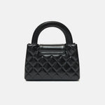 Chanel Mini Kelly crossbody bag in black color and Calfskin leather in GHW