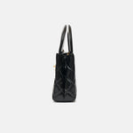 Chanel Mini Kelly crossbody bag in black color and Calfskin leather in GHW
