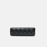 Chanel Mini Kelly crossbody bag in black color and Calfskin leather in GHW