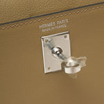 Hermès kelly danse crossbody in trench color and Swift leather in PHW