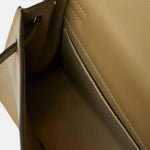 Hermès kelly danse crossbody in trench color and Swift leather in PHW