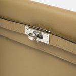 Hermès kelly danse crossbody in trench color and Swift leather in PHW