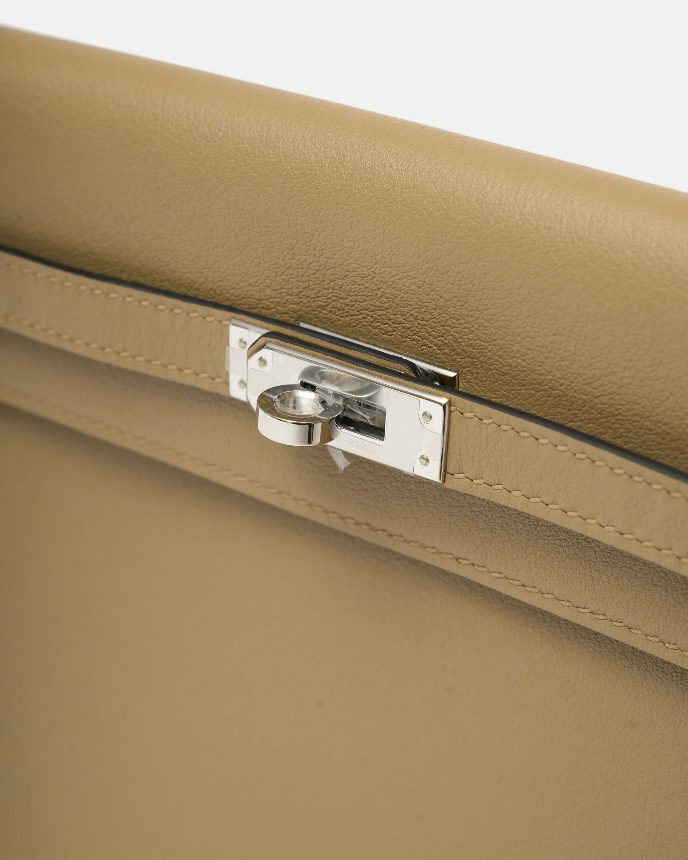 Hermès kelly danse crossbody in trench color and Swift leather in PHW
