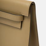 Hermès kelly danse crossbody in trench color and Swift leather in PHW