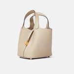 Hermès Mini Picotin 18 bucket bag in Trench color and Clemence leather in GHW