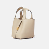 Hermès Mini Picotin 18 bucket bag in Trench color and Clemence leather in GHW