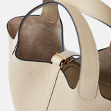 Hermès Mini Picotin 18 bucket bag in Trench color and Clemence leather in GHW