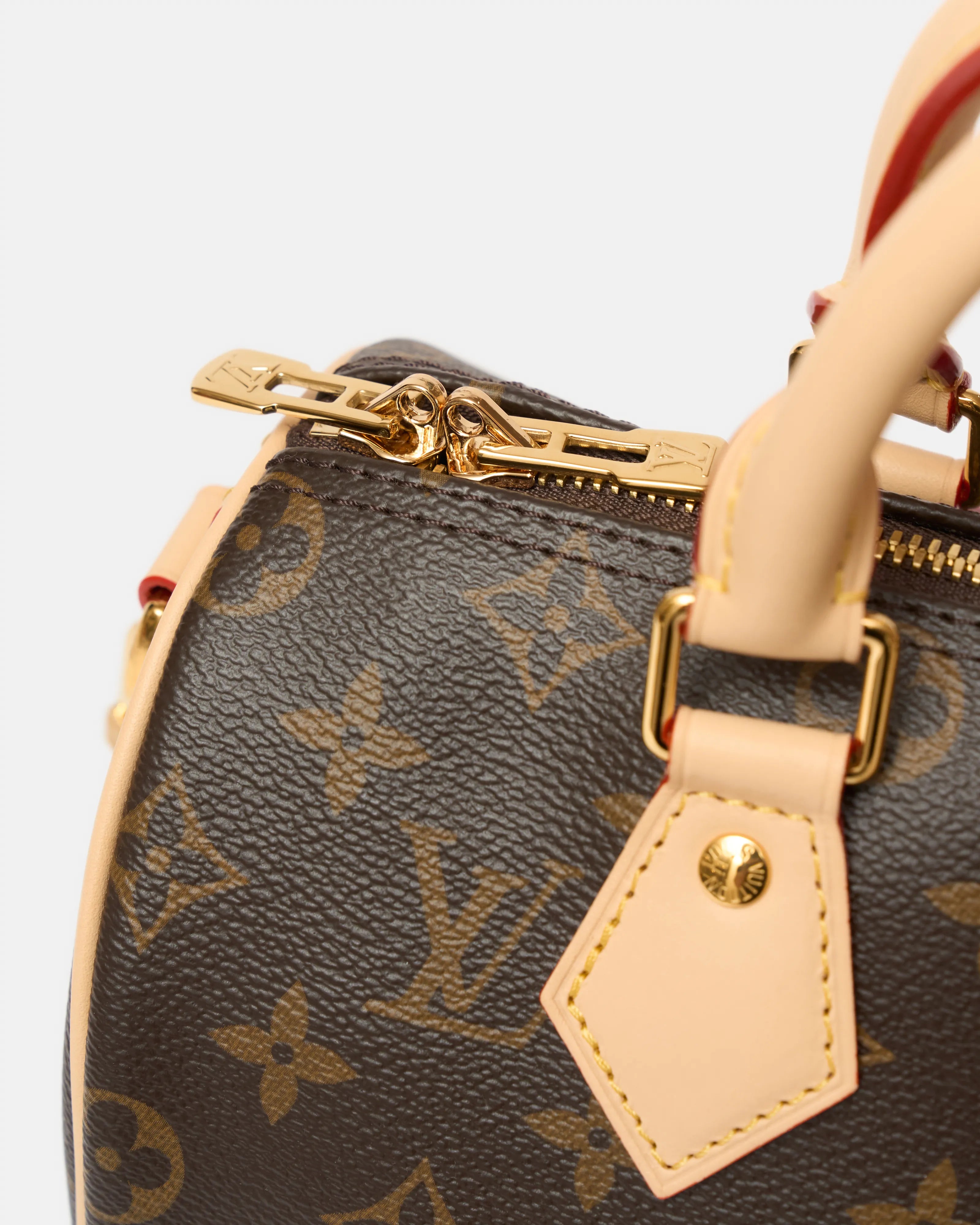 Louis vuitton speedy 25 satchel bag in brown color and monogram coated canvas in GHW 